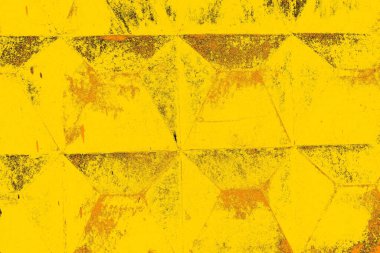 Kırmızı sarı ve siyah renkli kirli duvar, desenli arka plan.