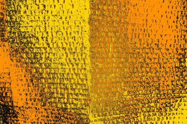 Kırmızı sarı ve siyah renkli kirli duvar, desenli arka plan.