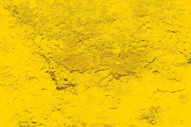 Kırmızı sarı ve siyah renkli kirli duvar, desenli arka plan.