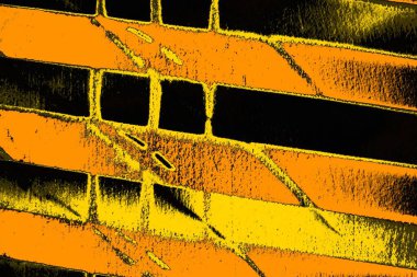 Kırmızı sarı ve siyah renkli kirli duvar, desenli arka plan.