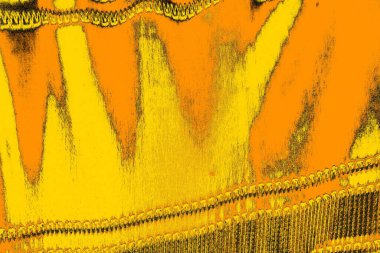 Kırmızı sarı ve siyah renkli kirli duvar, desenli arka plan.