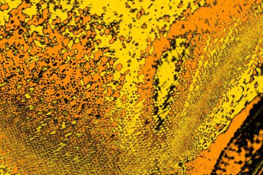 Kırmızı sarı ve siyah renkli kirli duvar, desenli arka plan.