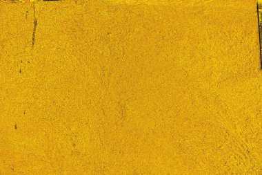 Kırmızı sarı ve siyah renkli kirli duvar, desenli arka plan.