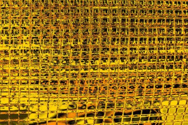 Kırmızı sarı ve siyah renkli kirli duvar, desenli arka plan.