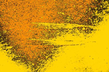 Kırmızı sarı ve siyah renkli kirli duvar, desenli arka plan.