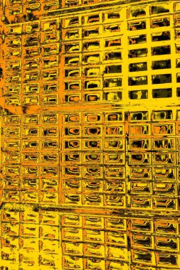 Kırmızı sarı ve siyah renkli kirli duvar, desenli arka plan.