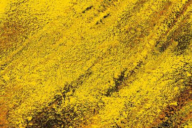 Kırmızı sarı ve siyah renkli kirli duvar, desenli arka plan.