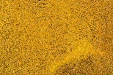 Kırmızı sarı ve siyah renkli kirli duvar, desenli arka plan.