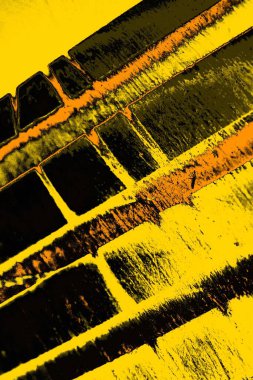 Kırmızı sarı ve siyah renkli kirli duvar, desenli arka plan.