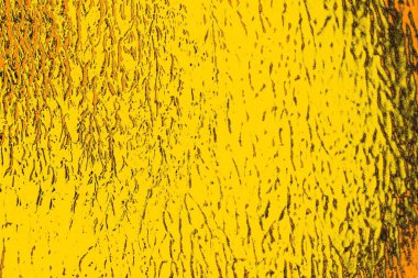 Kırmızı sarı ve siyah renkli kirli duvar, desenli arka plan.