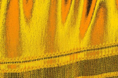 Kırmızı sarı ve siyah renkli kirli duvar, desenli arka plan.