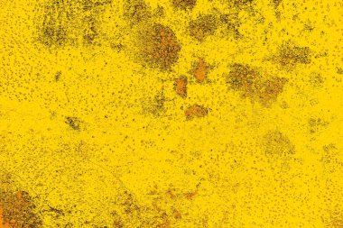 Kırmızı sarı ve siyah renkli kirli duvar, desenli arka plan.