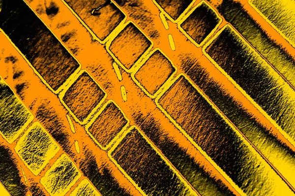 Kırmızı sarı ve siyah renkli kirli duvar, desenli arka plan.