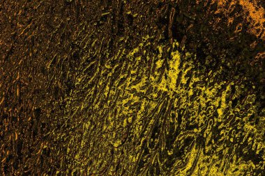 Kırmızı sarı ve siyah renkli kirli duvar, desenli arka plan.