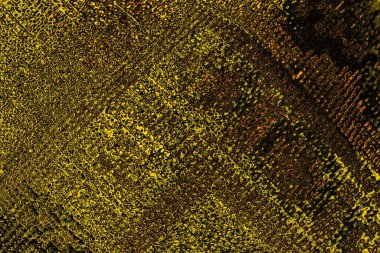 Kırmızı sarı ve siyah renkli kirli duvar, desenli arka plan.