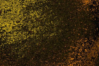 Kırmızı sarı ve siyah renkli kirli duvar, desenli arka plan.