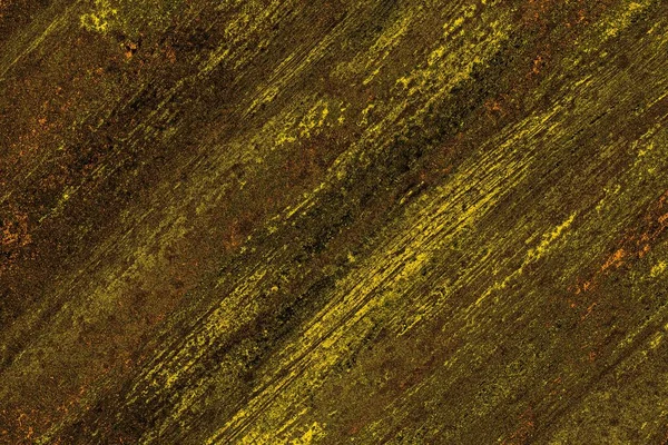 Kırmızı sarı ve siyah renkli kirli duvar, desenli arka plan.