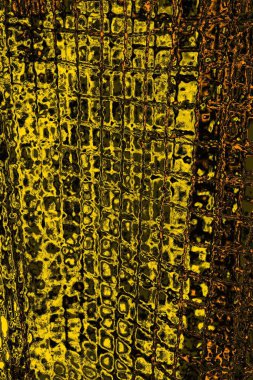 Kırmızı sarı ve siyah renkli kirli duvar, desenli arka plan.