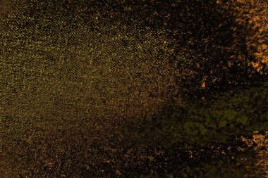 Kırmızı sarı ve siyah renkli kirli duvar, desenli arka plan.