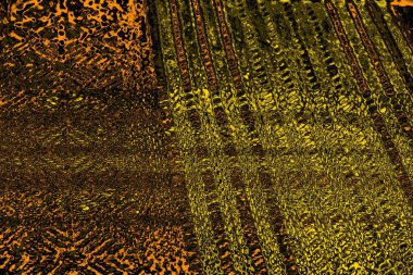 Kırmızı sarı ve siyah renkli kirli duvar, desenli arka plan.