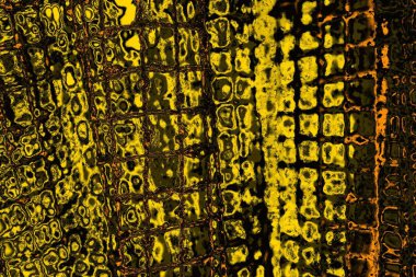 Kırmızı sarı ve siyah renkli kirli duvar, desenli arka plan.