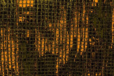 Kırmızı sarı ve siyah renkli kirli duvar, desenli arka plan.