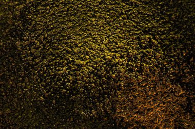 Kırmızı sarı ve siyah renkli kirli duvar, desenli arka plan.