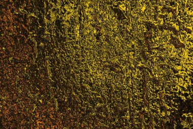 Kırmızı sarı ve siyah renkli kirli duvar, desenli arka plan.