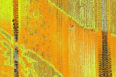 Kırmızı sarı ve siyah renkli kirli duvar, desenli arka plan.