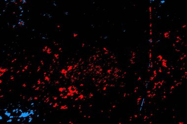 Kırmızı ve mavi renkli, soyut, esmer, pejmürde bir doku. Grunge arkaplanı, metin veya reklam için boşluk resmini kopyala