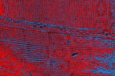 Soyut kırmızı ve mavi renkli pejmürde bir doku. Grunge arkaplanı, metin veya reklam için boşluk resmini kopyala