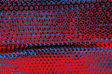 Kırmızı ve mavi renkli, soyut, esmer, pejmürde bir doku. Grunge arkaplanı, metin veya reklam için boşluk resmini kopyala