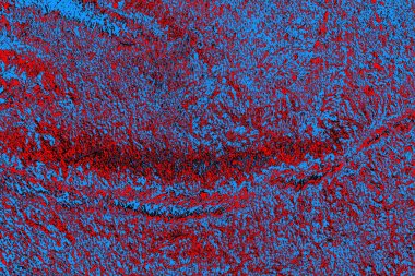 Soyut kırmızı ve mavi renkli pejmürde bir doku. Grunge arkaplanı, metin veya reklam için boşluk resmini kopyala