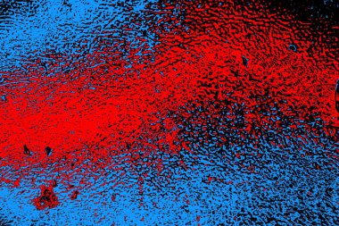 Soyut kırmızı ve mavi renkli pejmürde bir doku. Grunge arkaplanı, metin veya reklam için boşluk resmini kopyala