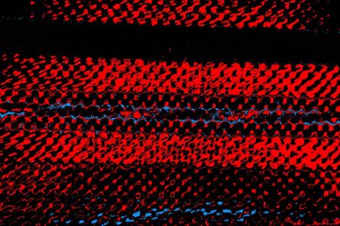 Kırmızı ve mavi renkli, soyut, esmer, pejmürde bir doku. Grunge arkaplanı, metin veya reklam için boşluk resmini kopyala