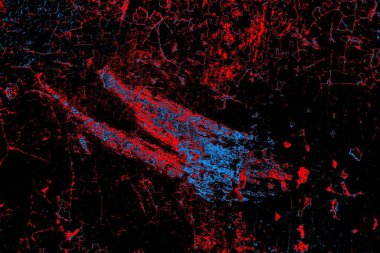 Karanlık tonlarda soyut, pejmürde bir doku. Grunge arkaplanı, metin veya reklam için boşluk resmini kopyala