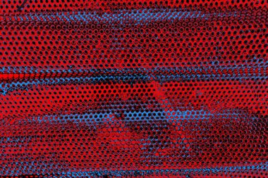 Soyut kırmızı ve mavi renkli pejmürde bir doku. Grunge arkaplanı, metin veya reklam için boşluk resmini kopyala