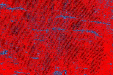 Soyut kırmızı ve mavi renkli pejmürde bir doku. Grunge arkaplanı, metin veya reklam için boşluk resmini kopyala