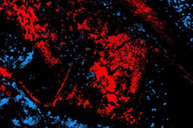 Kırmızı ve mavi renkli, soyut, esmer, pejmürde bir doku. Grunge arkaplanı, metin veya reklam için boşluk resmini kopyala