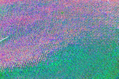 Soyut neon renkler çizik ve çatlaklarla dokulu duvar. 