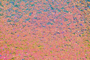 Arkaplan olarak kullanılmak üzere küçük taşlarla sıvanmış duvarın görüntüsü.