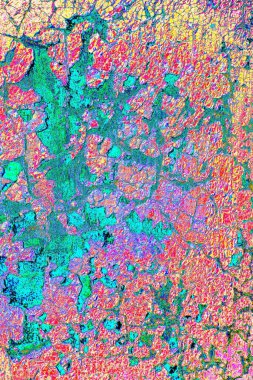 Duvar dokusu arkaplanı eski boyayla soyulmuş.