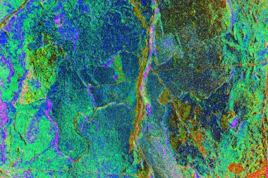 Soyut neon renkler çizik ve çatlaklarla dokulu duvar. 