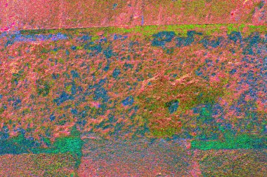 Soyut neon renkler çizik ve çatlaklarla dokulu duvar. 