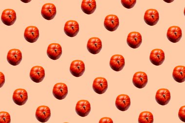 Turuncu arka planda balkabağı deseni. Hediye ambalaj kağıdı, web sayfası geçmişi, reklam afişi. Cadılar Bayramı