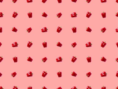 Tatlı dolmalık biber deseni. Renkli pembe arka planda sebzeler. Biber desenli reklam afişi. Paket kağıdı. Web sayfaları için arkaplan.