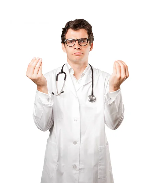 Confused doctor against white background