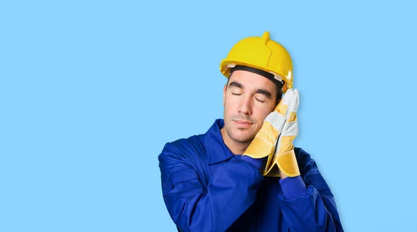 Tired worker sleeping on white background