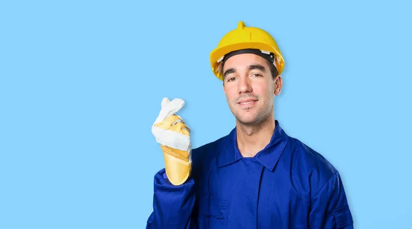 Happy worker with money gesture on white background