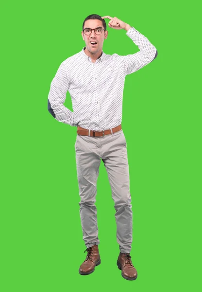 Puzzled young man with a gesture of confusion - Full body shot